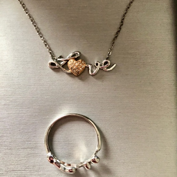 Zales solid sterling silver and rose gold .15ct diamond ring and necklace set. - Picture 3 of 3